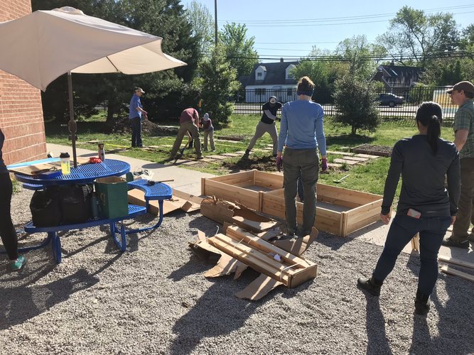 Volunteering on Earth Day at Elementary School and installing raised beds