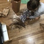 Activities To Do At Home With Toddler Shredding paper for compost
