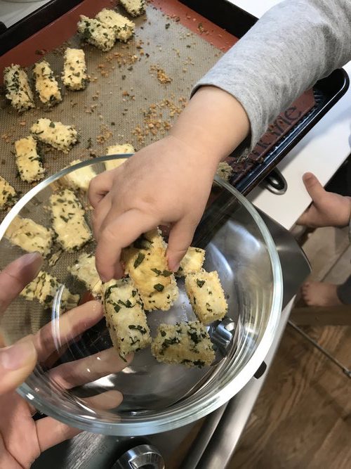 breading tofu with toddler